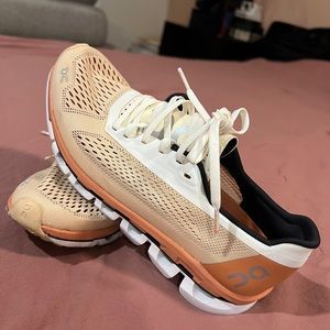 Beige Swiss made running shoes . Very elegant.